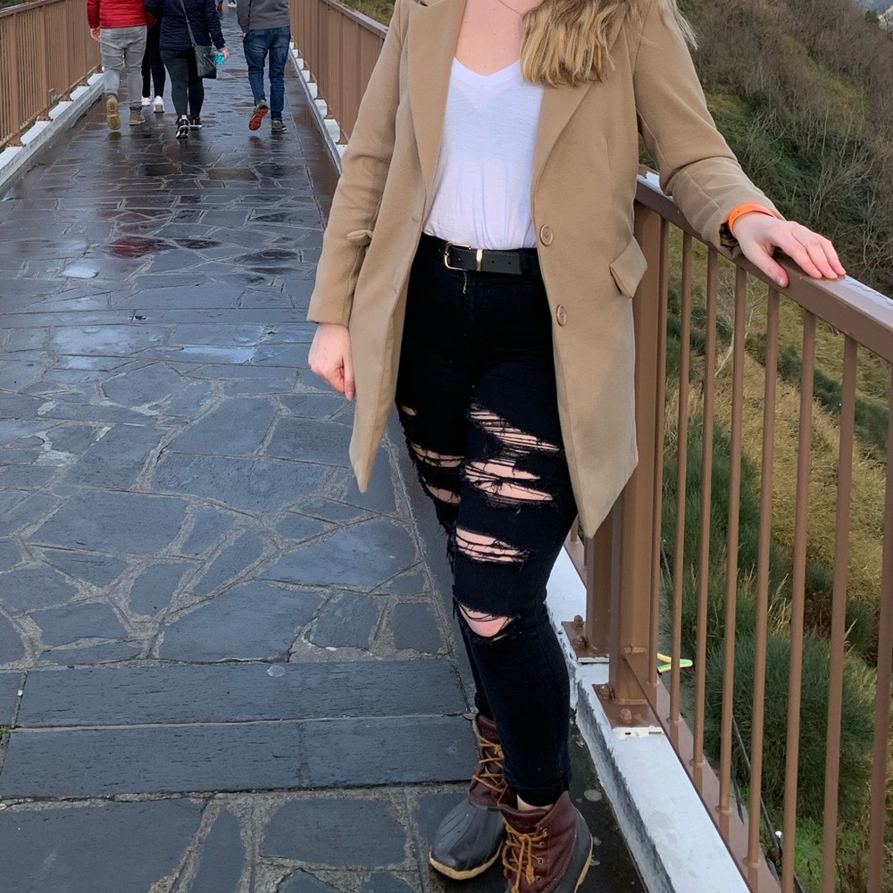 Black distressed super skinny jeans